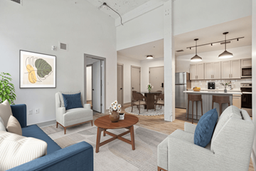 Baltimore apartment for rent - a living room and kitchen with couches and a table