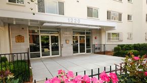 Washington apartment for rent - The front of a building with the number 1220 on it.