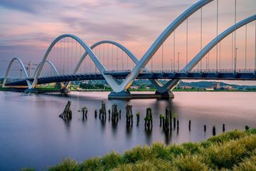Washington apartment for rent - A bridge with a unique design spans across a body of water.