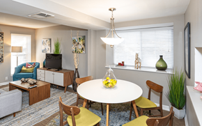 Saint Louis apartment for rent - A dining room with a round table and chairs.