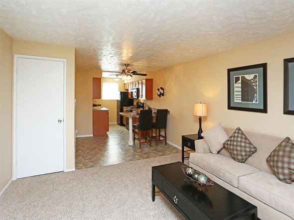 Omaha apartment for rent - a living room with a couch and a table