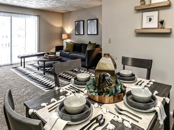 Omaha apartment for rent - a living room with a table with dishes on it