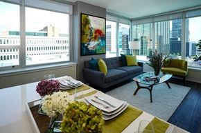Clayton apartment for rent - A modern dining room with a view of the city at Two Twelve Clayton Apartments, Clayton, Missouri