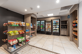A frozen food section of a grocery store.