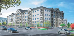 Portland apartment for rent - A large apartment building with a parking lot in front.