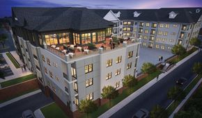 Portland apartment for rent - A large, modern building with a lot of windows and a spacious courtyard.