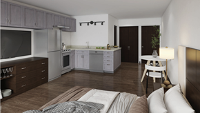 Danbury apartment for rent - A modern kitchen with a refrigerator, oven, and cabinets.