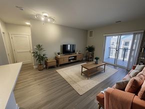 Portland apartment for rent - A living room with a television, a couch, and a coffee table.