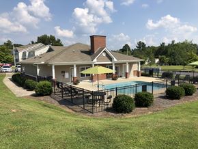 Oxford apartment for rent - a large yard with a pool and a house