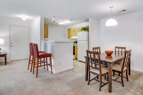 Henrico apartment for rent - A dining room with a table and chairs.