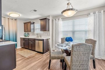Myrtle Beach apartment for rent - A modern kitchen with a dining table set for two.