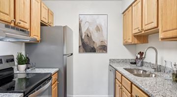 Newport News apartment for rent - A kitchen with wooden cabinets and a fridge.