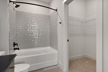 Bathroom with white bathtub