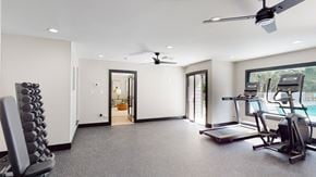 Raleigh apartment for rent - a workout room with treadmills and a treadmill