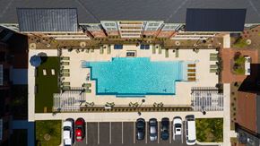 Glen Allen apartment for rent - An aerial view of a pool surrounded by a parking lot.