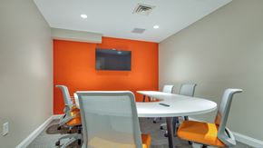 Blacksburg apartment for rent - A conference room with a white table and chairs.