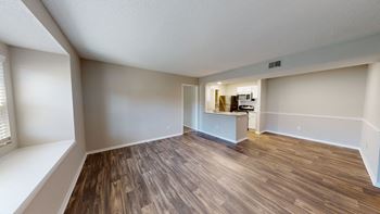 Contemporary finishes include wood and tile flooring