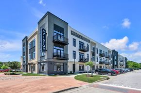 Newport News apartment for rent - A row of modern apartment buildings with balconies and the name "Aviator" on the facade.