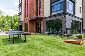 Outdoor games (bocce court, cornhole & ping pong)