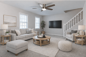 Dundalk apartment for rent - A living room with a grey couch, a coffee table, and a television.
