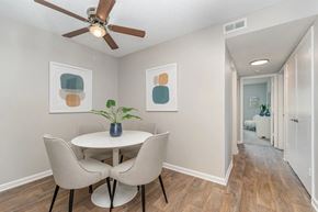 Greensboro apartment for rent - a dining room with a table and chairs and a ceiling fan at Village 1373, Greensboro, NC 27455