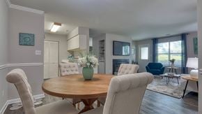 Newport News apartment for rent - a living room and dining room with a table and chairs