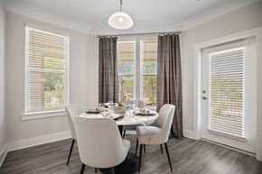 Durham apartment for rent - an image of a dining room with a table and chairs at Ellis Station, Durham, NC