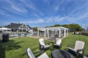 Dublin townhouse for rent - A backyard with a pool and patio furniture.