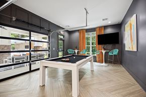 Raleigh townhouse for rent - a games room with a pool table and a tv at Shellbrook, North Carolina