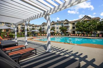 Spacious pool deck with family seating