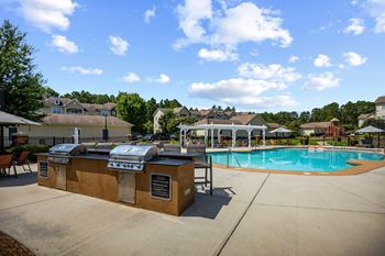 Outdoor propane grilling station with bar-top seating