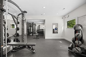 Expanded & enhanced fitness studio with workout mirror