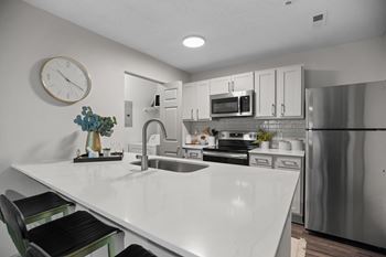 Chic kitchens with white shaker cabinets and subway tile backsplash*