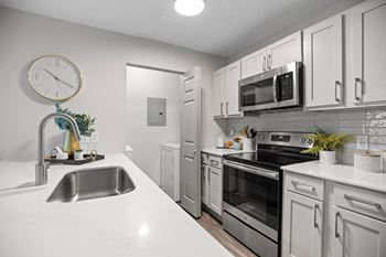 Black stainless steel appliance package*