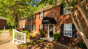 Williamsburg apartment for rent - a red brick building with a black awning