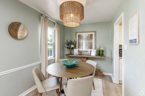 Newport News apartment for rent - A dining room with a round table and chairs.