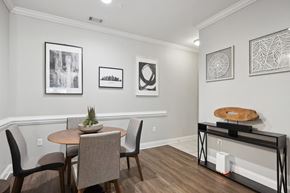 Charlotte apartment for rent - A dining room with a table and chairs.