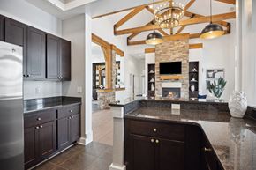 Charlotte apartment for rent - a kitchen with granite counter tops and a fireplace
