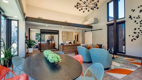 Ashland apartment for rent - A modern dining room with a round table and chairs.