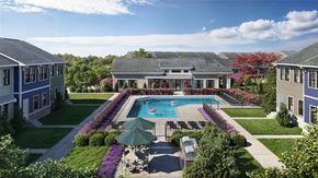 Harrisonburg townhouse for rent - A large house with a pool in the backyard.