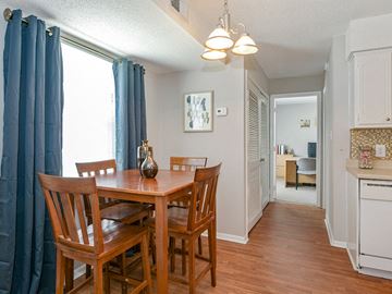 Raleigh apartment for rent - A dining room with a table and chairs.