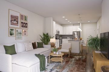 Midlothian apartment for rent - A living room with a white couch and a television.