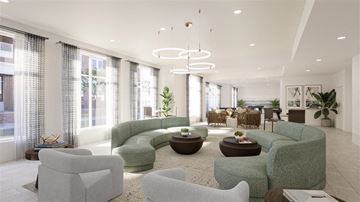 Norfolk apartment for rent - a living room filled with furniture and large windows