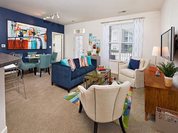 Petersburg apartment for rent - a living room with blue walls and white furniture at Addison Crater Woods, Virginia