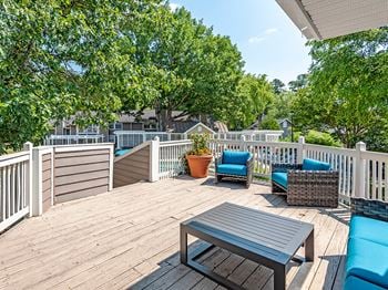 Chairs on deck  at vert at six forks apartments in raleigh, nc