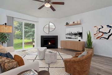 Dublin apartment for rent - A living room with a fireplace and a painting on the wall.