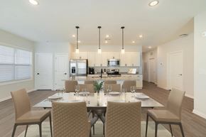 Southern Pines apartment for rent - A modern dining room with a table set for four.