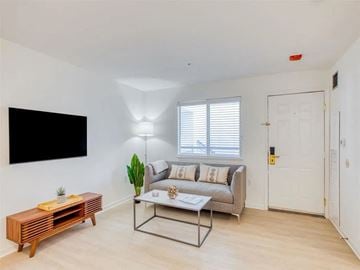 Rockville apartment for rent - a living room with a couch and a coffee table
