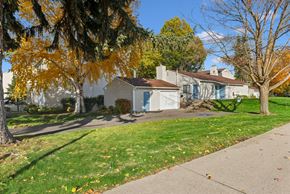 Spokane Valley apartment for rent - Lawn area surrounding the house at Peaks on Pines, Washington, 99216