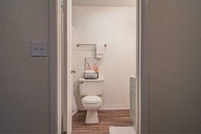 Boise apartment for rent - A white toilet in a small bathroom.